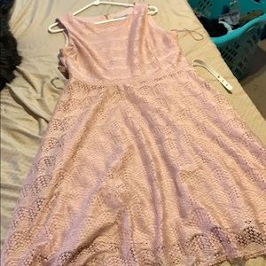 Blush, lace, sleeveless dress with matching belt.
